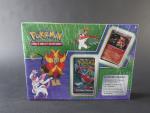 Carte Pokemon
Contenu : Coffret Poing furieux
- 4 boosters 
- 1 carte...