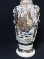 SATZUMA - Vase balustre à décor de personnages (usure).
Hauteur :...