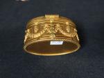 Bonbonnières de style Louis XVI en laiton doré.
ON JOINT 
Une...