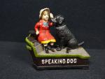 SPEAKING DOG - Une tirelire articulée en fonte peinte représentant...