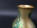 ZSOLNAY PECS : Vase 'toupie" en céramique à lustre métallique...