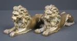 Paire de lions couchés en bronze doré, ép. XVIII's. Haut...