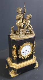 Pendule borne d'époque Napoléon III en marbre noir et ornement...