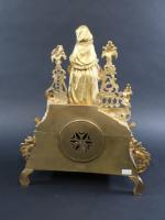 Pendule d'époque Napoléon III en bronze doré à décor d'une...
