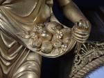 Pendule d'époque Empire en bronze doré à décor d'une jardinière...