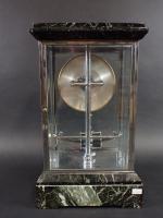 BULLE-CLOCK : Pendule-cage électrique en métal chromé et marbre vert...