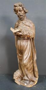 Saint- Personnage en bois sculpté, ép. XVII'. Haut. : 87...