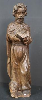 Saint- Personnage en bois sculpté, ép. XVII'. Haut. : 87...