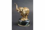 CHARLES Charles (XIX's-XX's) : Eléphant barrissant. Bronze à patine dorée...