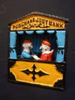 Tirelire mécanique en fonte laquée "PUNCHAND JUBY BANK" représentant un...