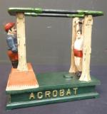 Tirelire mécanique en fonte laquée "ACROBAT BANK" représentant un gymnaste...