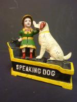 Tirelire mécanique en fonte laquée "SPEAKING DOG BANK" représentant une...