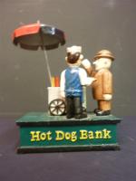 Tirelire mécanique en fonte laquée "HOT DOG BANK" représentant un...