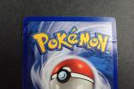 Carte Pokemon 
Contenu : 1 carte rare Dracaufeu 
Edition : 1er édition...