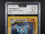 Carte Pokemon 
Contenu : Mackogneur
Edition : 1er édition du set de base...