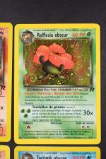 Carte Pokemon 
Contenu : 4 cartes rares dont Dracaufeu obscur, Raflésia...