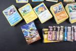 Carte Pokemon 
Contenu : Ensemble de quelques centaines de cartes rares,...