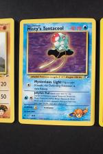 Carte Pokemon 
Contenu : 3 cartes rares dont Sabrina's gengar, Misty's...