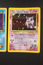 Carte Pokemon 
Contenu : 3 cartes rares dont Sabrina's gengar, Misty's...