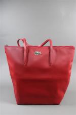 LACOSTE. Grand sac cabas en toile enduite rouge à deux...