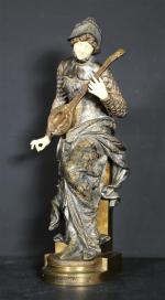 CARRIER-BELLEUSE Louis (1848-1913) : Mélodie. Bronze chryséléphantin à patine bicolore...