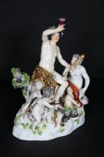 SAXE : Groupe en porcelaine polychrome à décor de Bacchus...