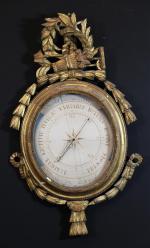 Baromètre ovale selon Toricelli d'époque Louis XVI en bois doré...