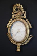Baromètre ovale selon Toricelli d'époque Louis XVI en bois doré...