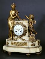 Pendule de style Louis XVI en bronze doré et marbre...