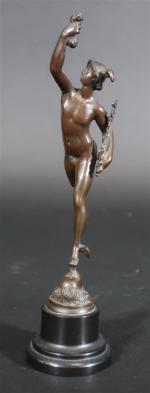 D'après Jean de BOLOGNE : Mercure. Bronze patiné sur socle...