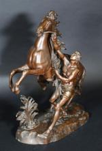 D'après Guillaume COUSTOU : Cheval de Marly. Bronze patiné signé....