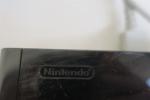 NINTENDO - Console Wii U noire. Avec coque de protection...