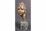 PUECH Denys (1854-1942) : Tête de jeune femme. Bronze patiné...
