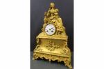 Pendule dépoque Louis-Philippe en bronze doré représentant une Vierge à...