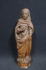 Vierge en chêne sculpté avec restes de polychromie au visage...