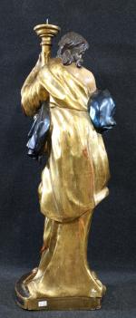 Personnage drapé faisant porte-torchère en bois sculpté doré et peint,...