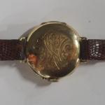 Ancienne montre de col en or 750 millième à cuvette...