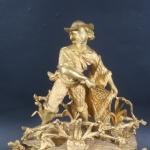 Pendule d'époque Napoléon III en régule doré à décor d'un...