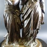 GREGOIRE Léon (XIX's) : Pendule en marbre noir surmontée d'un...