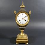 Pendule d'époque début XIX's en bronze doré et patiné en...