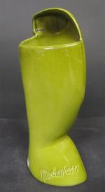 NIEDERKORN. Vase "Profile de femme" en céramique émaillée vert, signé...